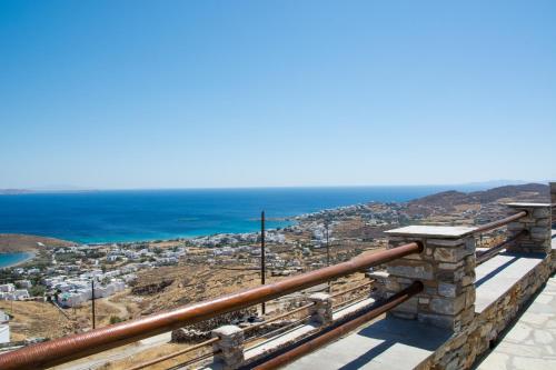 a view of the ocean from a balcony at Villa Anemelia Tinos in Agios Ioannis