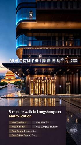a large building with a sign in front of it at Mercure Xi'an Daming Palace in Xi'an