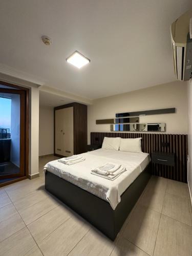 a bedroom with a large bed in a room at Mad Sea Beach Hotel in Şile