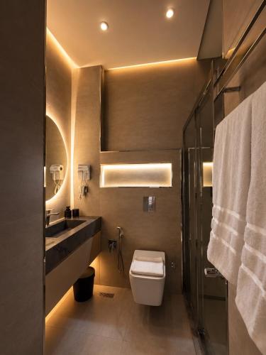 a bathroom with a toilet and a sink at Amara Boutique in Baku