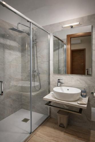 a bathroom with a sink and a shower at Da Nonna Iolanda in Caiazzo