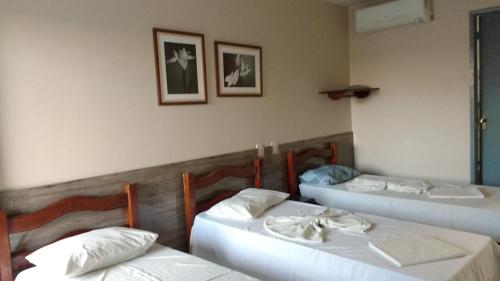 Postel nebo postele na pokoji v ubytování Pousada Araguaia