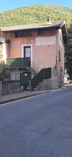 a building on the side of a street at Casa Olivia in Margno
