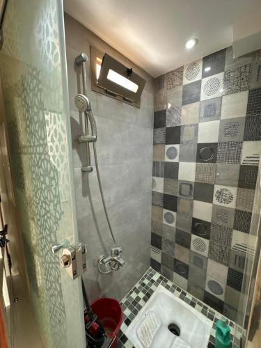 a bathroom with a shower and a sink at luxury apartament golf the beach capuchino in Cabo Negro