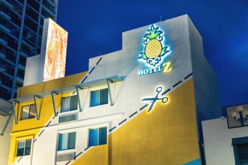 
a building that has a clock on the side of it at Staypineapple, Hotel Z, Gaslamp San Diego in San Diego

