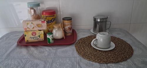 a kitchen counter with a tray with food and ingredients at COMODIDADe in Colmenar Viejo