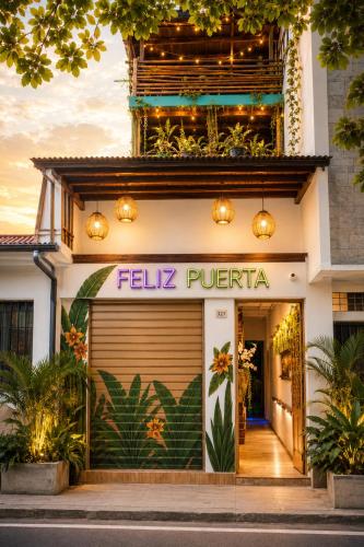 a facade of a store with a sign that reads fula puerta at Feliz Puerta - Entire House with Rooftop Terrace, Iquitos in Iquitos