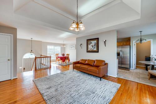 a living room with a couch and a table at Birmingham Haven New Deck King Bed No Cleaning Fee in Birmingham