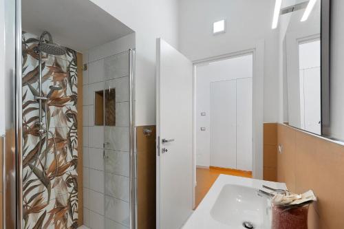 a bathroom with a sink and a shower at La Casa Di Zio Michelino in Pimonte