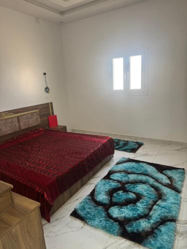 a bedroom with a bed and two rugs on the floor at Venice Private Retreat Tripoli, Libya in Tripoli