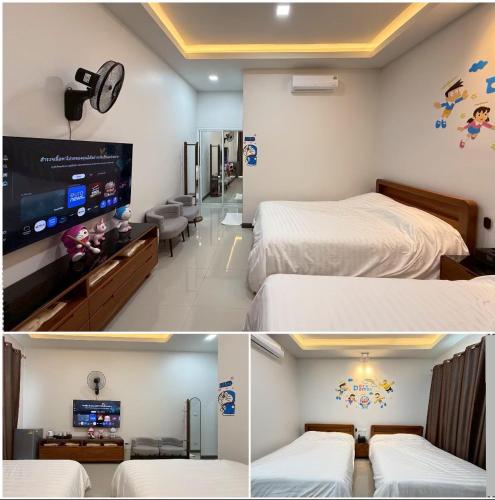 a hotel room with two beds and a flat screen tv at My friend private pool villa in Samut Songkhram
