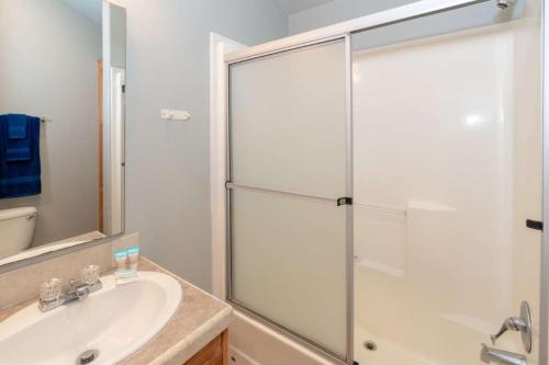 a bathroom with a shower and a sink at Sun Outdoors Ocean City in Ocean City