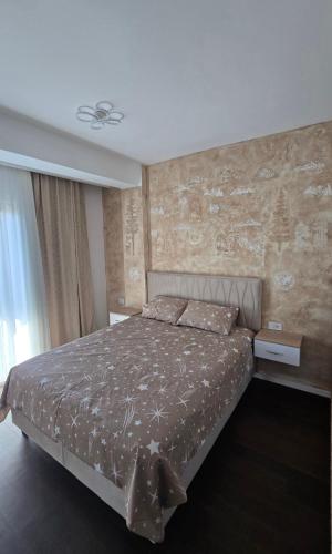 a bedroom with a bed in a room at Stan apartman Kolašin in Kolašin
