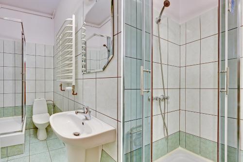 Kúpeľňa v ubytovaní Nice Rooms - Pokoje Gościnne