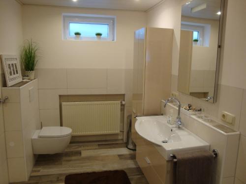 Ένα μπάνιο στο Ferienwohnung am Eck