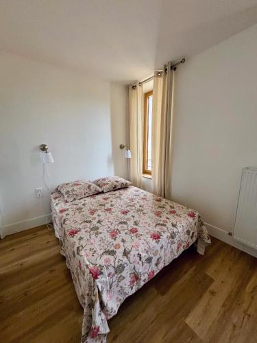 Postel nebo postele na pokoji v ubytování Maison Auctoire