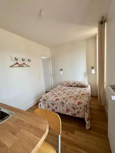 Postel nebo postele na pokoji v ubytování Maison Auctoire