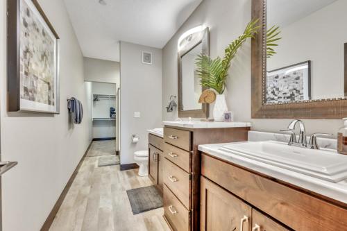 a bathroom with a sink and a toilet at Bridges Bay Resort Bayside Building 203 in Arnolds Park