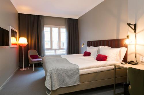 Postel nebo postele na pokoji v ubytování Elite Hotel Adlon