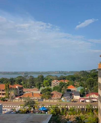 a view of a city from a building at Meraki Palate in Entebbe