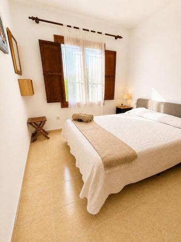 Apartamento con jardín, piscina y parking