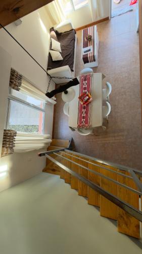 a view from the top of the stairs in a house at Cabañas Hueney Ruca in Sierra de la Ventana