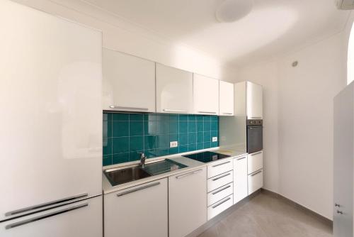 Una cocina o zona de cocina en Il Gabbiano Apartment