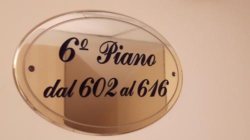 a mirror with the words fame written on it at Hotel Grifone in Rimini