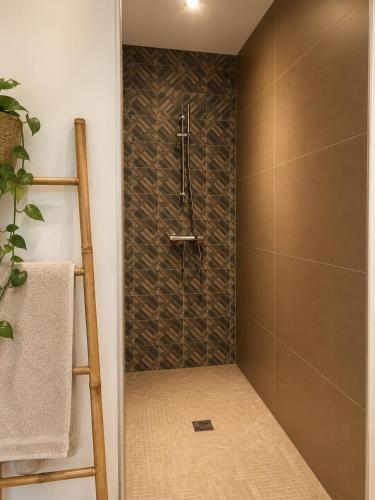 a shower in a bathroom with a ladder at Villa SoleLuna in Bonifacio