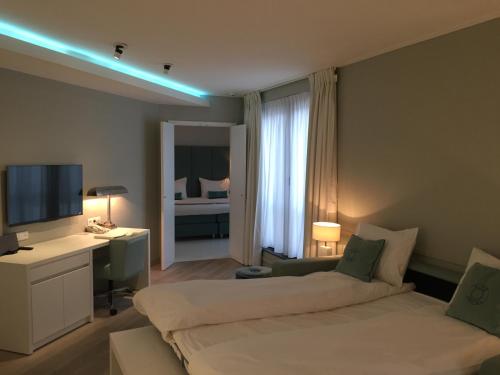 Katil atau katil-katil dalam bilik di VixX Suites
