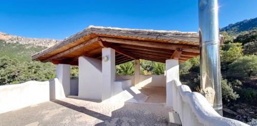 a building with a wooden roof with a view at Spacious Apartment in Yeste with Shared Pool in Yeste