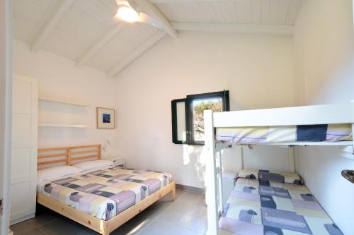 Двох'ярусне ліжко або двоярусні ліжка в номері Villaggio Turistico Elea
