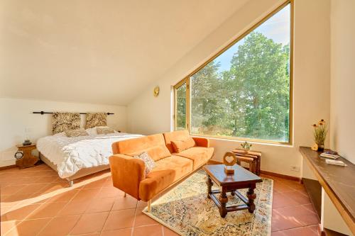 En eller flere senge i et værelse på Villa Roccollina