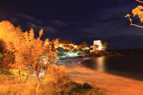 a view of a river at night at Nascar Hotel in Santa Maria Navarrese