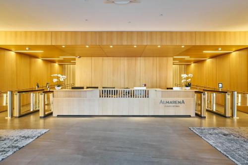 a lobby of an amazon office with a reception desk at Almarena Puerto Retiro, Affiliated by Meliá in Buenos Aires