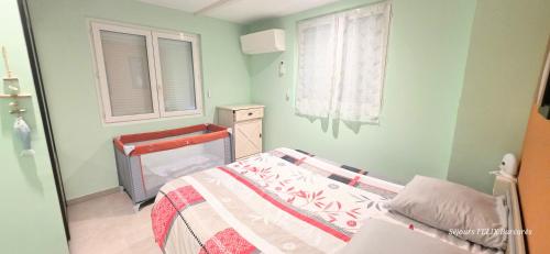 LE BARCARES - plage et village de Noël à pied - logement "Aiguamar" climatisé 1 chambre avec terrasse, 4 personnes - parking privé