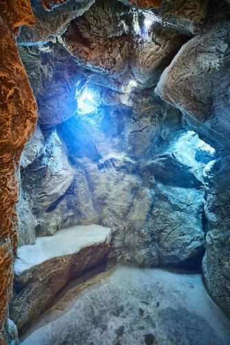 an inside view of a cave with snow and ice at Lucky Bansko Aparthotel SPA & Relax in Bansko