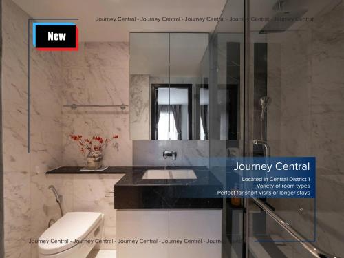 a bathroom with a sink and a mirror at Journey Central - ZENITY & D1 MENSION in Ho Chi Minh City