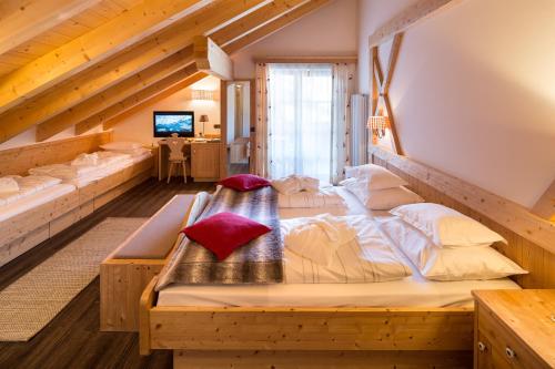 Postel nebo postele na pokoji v ubytování Hotel Somont