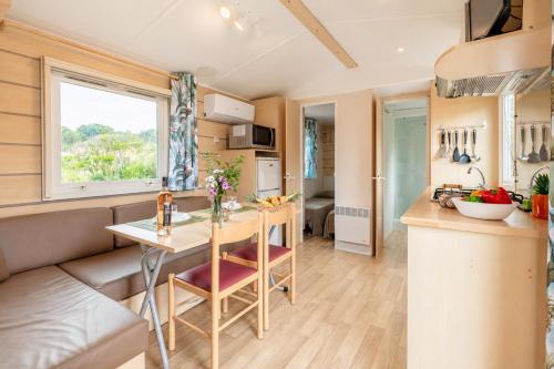 Le Photinia, mobil-home climatisé avec vue mer situé au cœur du domaine