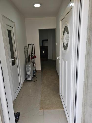 an empty hallway with a door and a room at Beogradski mir in Belgrade