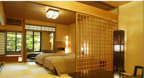 a bedroom with a large bed in a room at The hideout peaks in Bhīm Tāl