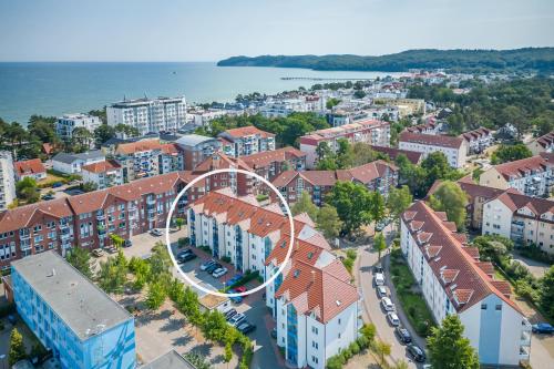 an aerial view of a city with a roller coaster at K & R Appartements Binz in Binz