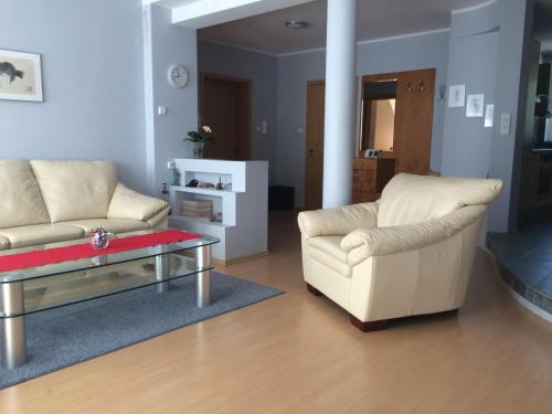 Posezení v ubytování Apartament przy Bacha