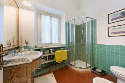 a bathroom with a shower and a sink at Villa Pian dei Giullari con Piscina in Florence