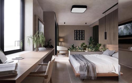 เตียงในห้องที่ Pharia Hotel & Residences