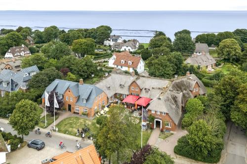 an aerial view of a house in a residential neighborhood at Seepferdchen in Keitum