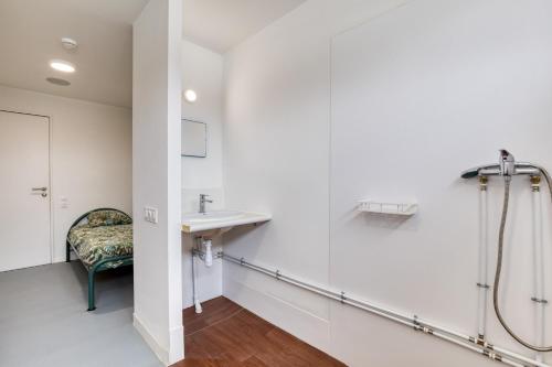 a bathroom with a shower and a sink at Résidence Arkenciel 1 in Mudaison