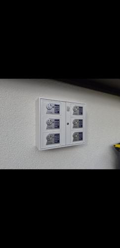 a control panel on the side of a wall at Nektarios Apartments in Kernen