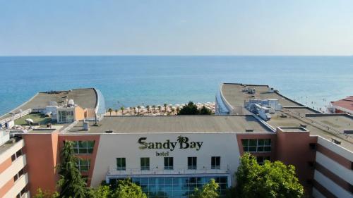 a view of the beach from a building at Sandy Bay Resort - All Inclusive Private Beach Hotel in Sveti Vlas